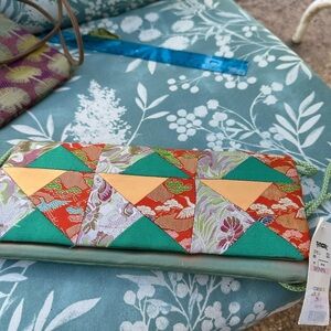 Silk clutch Asian Design . Cord shoulder strap